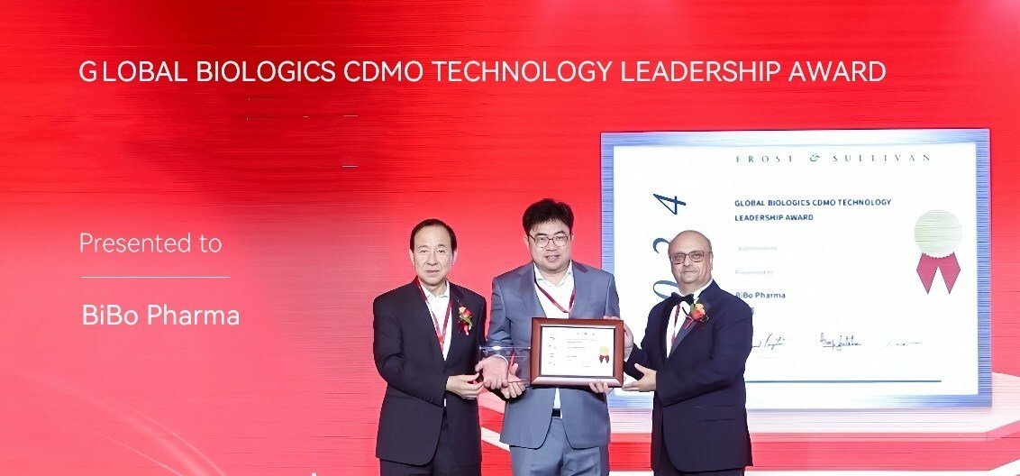 Peng Jiao, founder, president & CEO of BiBo Pharma & Boston Institute of Biotechnology, LLC accepts Frost & Sullivan's 2024 Global Biologics CDMO Technology Leadership Award.